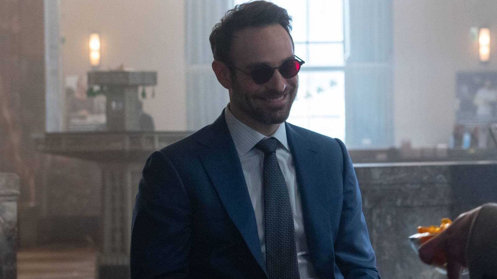 Charlie Cox smiling as Matt Murdock in Daredevil Born Again