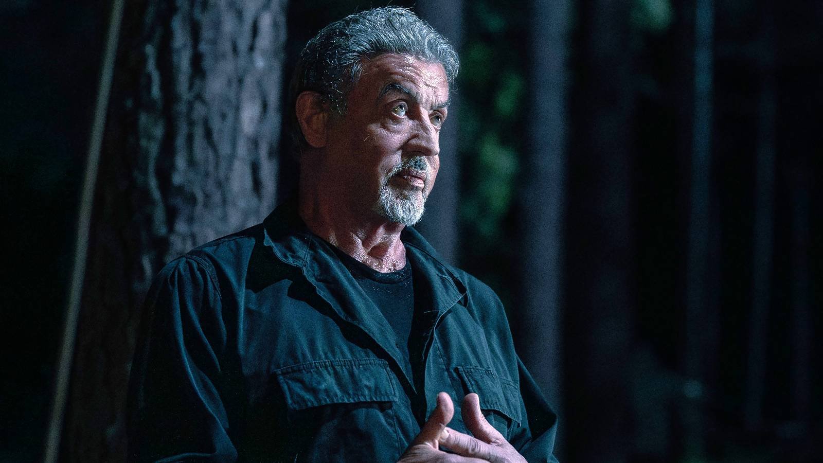 Sylvester Stallone's Manfredi looking angry with his hands swirling each other in Tulsa King seas...