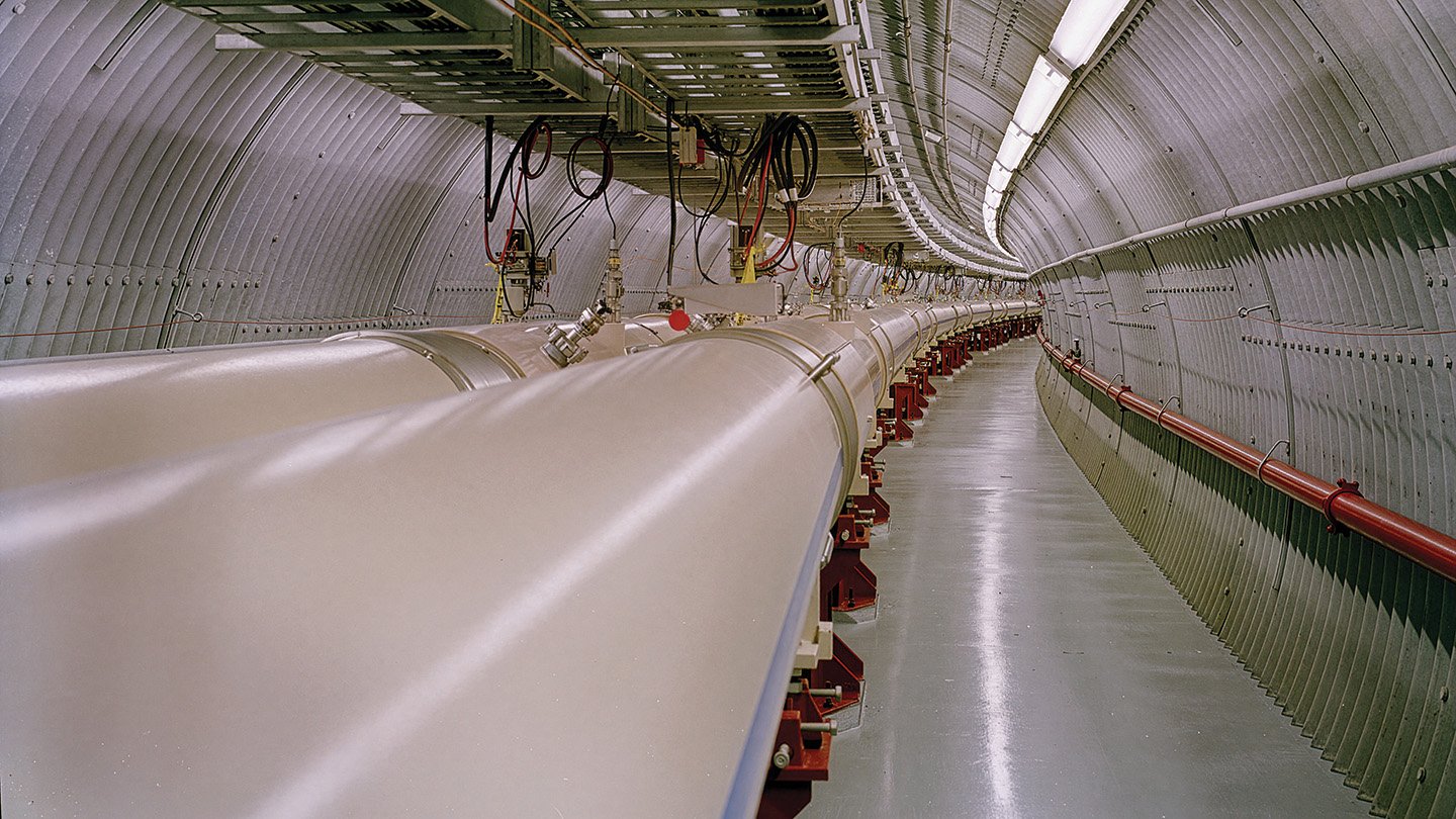The Relativistic Heavy Ion Collider consisted of two rings (shown) that accelerated protons and a...