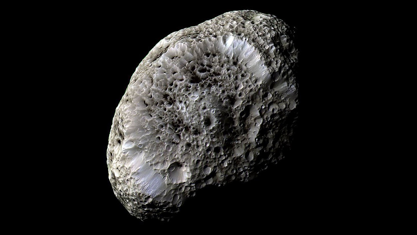 Saturn’s odd moon Hyperion, photographed by NASA’s Cassini spacecraft in 2005, could be debri...