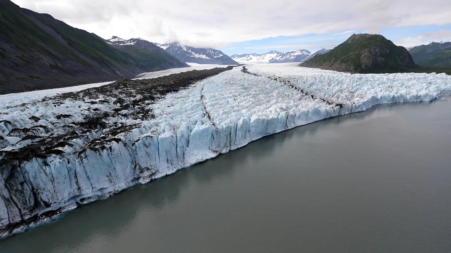 Destabilized by the warm lake expanding at its front, Alaska’s Bear Glacier has retreated four ...