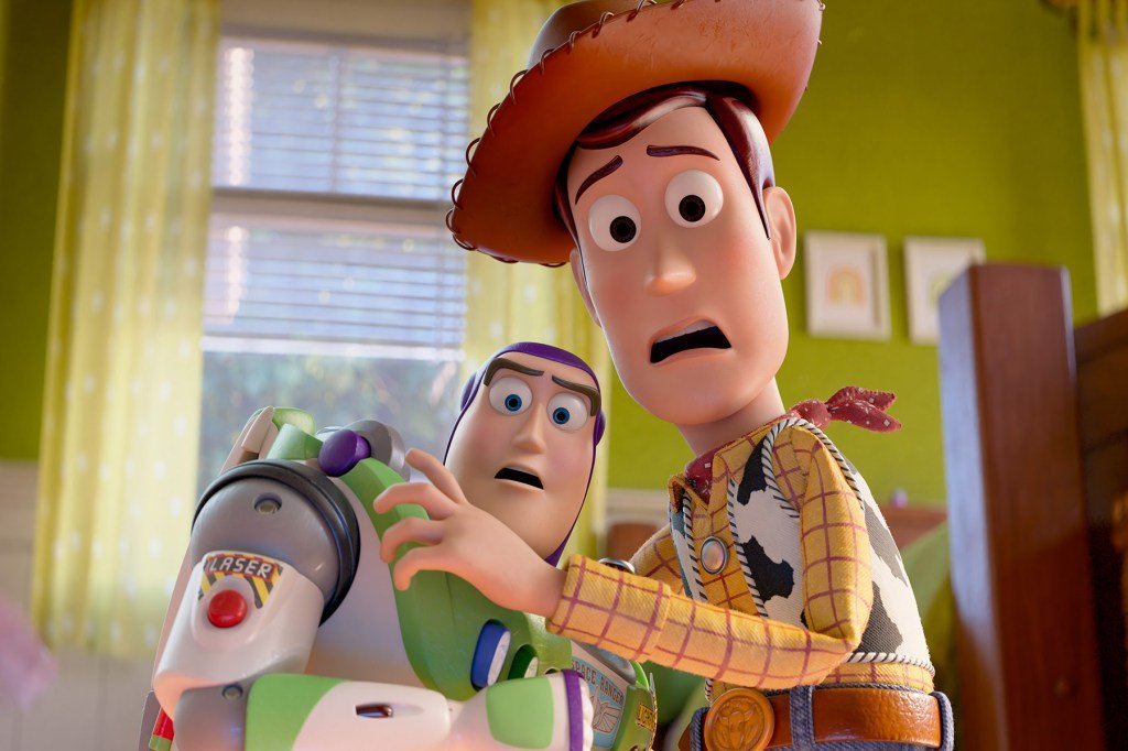 Buzz Lightyear (voiced by Tim Allen) and Woody (voiced by Tom Hanks) in Disney and Pixar's TOY ST...