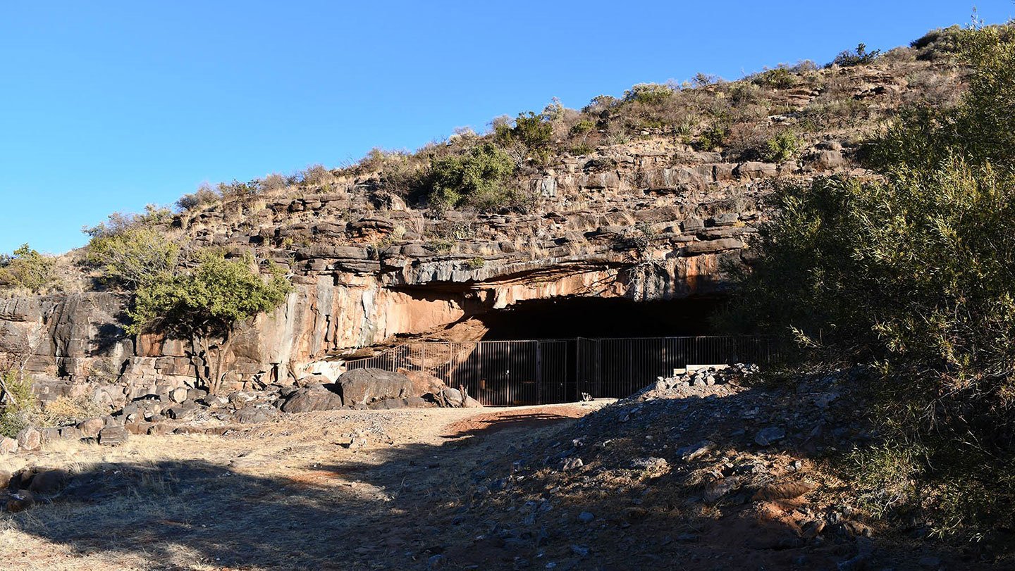 New evidence of early fire use comes from South Africa's Wonderwork Cave, which was inhabited by ...