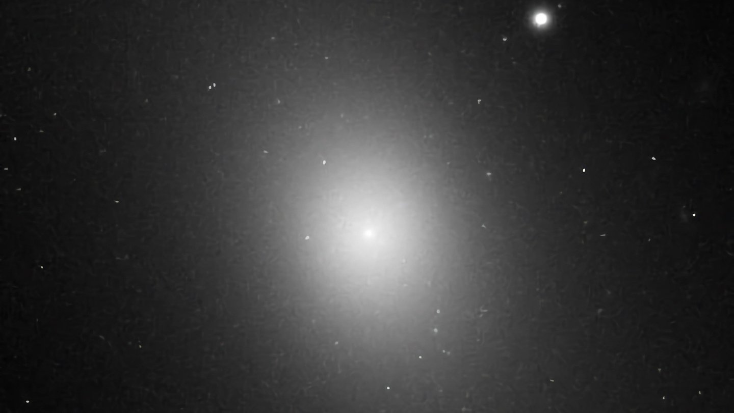 The elliptical nature of IC 1101, the largest known galaxy, is shown in this image taken by the H...
