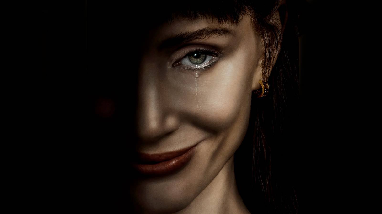 Jessica Chastain with a tear in her eye on the Other Mommy Poster (2026)