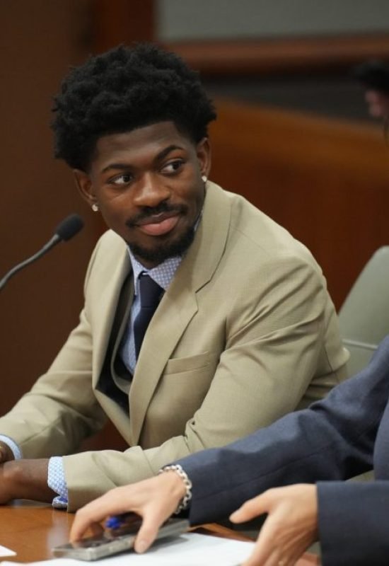 Grammy-winning musician Lil Nas X, whose legal name is Montero Hill, appears in court for a preli...