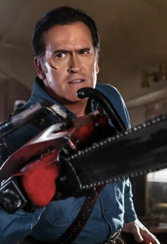 Ash holds his chainsaw toward the camera in Ash vs. the Evil Dead