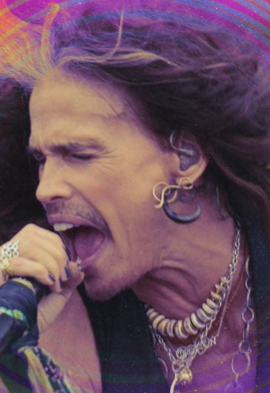 Steven Tyler delivers his iconic high-register scream during a performance of 